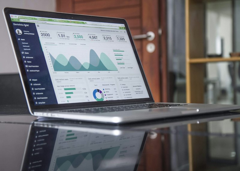 Shopify SEO analytics dashboard on a laptop
